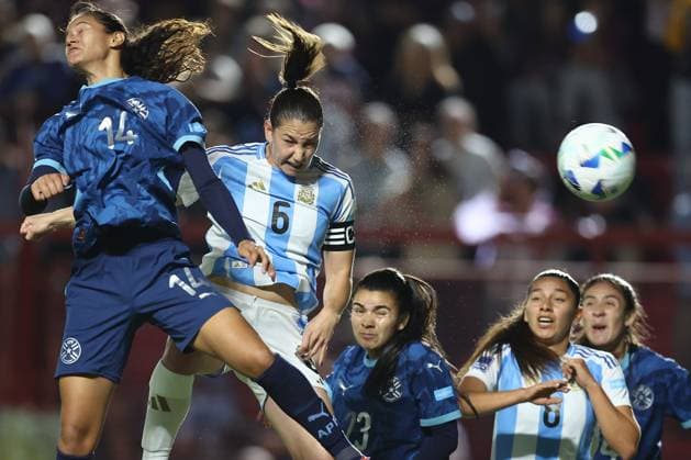 Argentina s defender Aldana Cometti 2nd L heads and scores the team™s first goal during the CONMEBOL Women s Nations League football match, qualifier for the 2027 World Cup in Brazil, between Argentina and Paraguay, at the Diego Armando Maradona stadium in Buenos Aires, Argentina on October 24, 2025 BUENOS AIRES ARGENTINA Copyright: xALEJANDROxPAGNIx