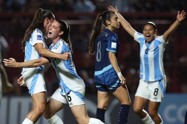 Argentina s defender Aldana Cometti 2nd L celebrates with teammates after scoring the team™s first goal during the CONMEBOL Women s Nations League football match, qualifier for the 2027 World Cup in Brazil, between Argentina and Paraguay, at the Diego Armando Maradona stadium in Buenos Aires, Argentina on October 24, 2025 BUENOS AIRES ARGENTINA Copyright: xALEJANDROxPAGNIx