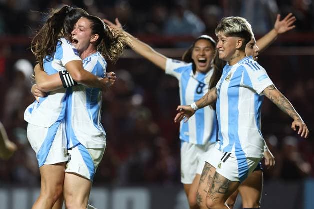 Argentina s defender Aldana Cometti 2nd L celebrates with teammates after scoring the team™s first goal during the CONMEBOL Women s Nations League football match, qualifier for the 2027 World Cup in Brazil, between Argentina and Paraguay, at the Diego Armando Maradona stadium in Buenos Aires, Argentina on October 24, 2025 BUENOS AIRES ARGENTINA Copyright: xALEJANDROxPAGNIx