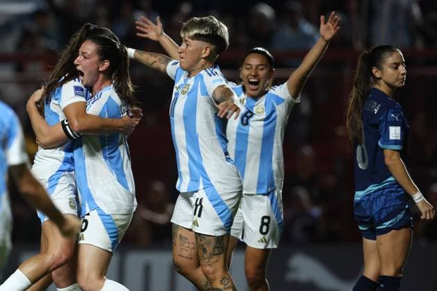 Argentina s defender Aldana Cometti 2nd L celebrates with teammates after scoring the team™s first goal during the CONMEBOL Women s Nations League football match, qualifier for the 2027 World Cup in Brazil, between Argentina and Paraguay, at the Diego Armando Maradona stadium in Buenos Aires, Argentina on October 24, 2025 BUENOS AIRES ARGENTINA Copyright: xALEJANDROxPAGNIx