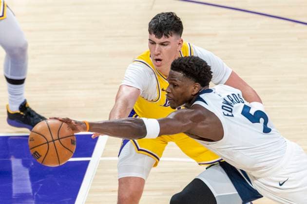 October 24, 2025, Los Angeles, California, USA: Minnesota Timberwolves Anthony Edwards (5) and Los Angeles LakersÃ¢â‚¬â ¢ Jake LaRavia (12) vie for the ball during an NBA, Basketball Herren, USA basketball game, in Los Angeles Friday, Oct. 24, 2025. Los Angeles USA - ZUMAc68_ 20251024_zaf_c68_018 Copyright: xRingoxChiux