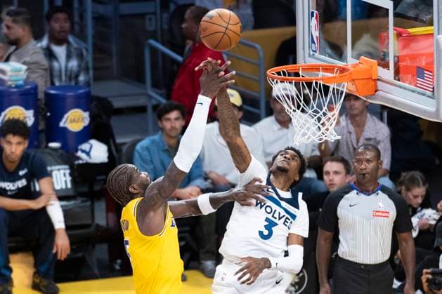 October 24, 2025, Los Angeles, California, USA: Minnesota Timberwolves Jaden McDaniels (3) and Los Angeles LakersÃ¢â‚¬â ¢ Deandre Ayton (5) vie for the ball during an NBA, Basketball Herren, USA basketball game, in Los Angeles Friday, Oct. 24, 2025. Los Angeles USA - ZUMAc68_ 20251024_zaf_c68_022 Copyright: xRingoxChiux
