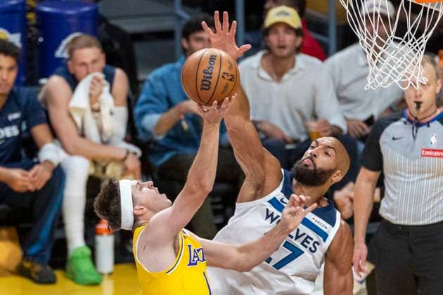 October 24, 2025, Los Angeles, California, USA: Minnesota Timberwolves Rudy Gobert (27) blocks a shot by Los Angeles LakersÃ¢â‚¬â ¢ Austin Reaves (15) during an NBA, Basketball Herren, USA basketball game, in Los Angeles Friday, Oct. 24, 2025. Los Angeles USA - ZUMAc68_ 20251024_zaf_c68_030 Copyright: xRingoxChiux