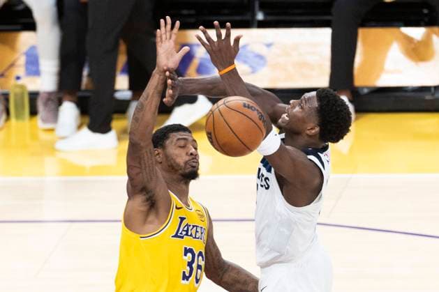 October 24, 2025, Los Angeles, California, USA: Minnesota Timberwolves Anthony Edwards (5) and Los Angeles LakersÃ¢â‚¬â ¢ Marcus Smart (36) vie for the ball during an NBA, Basketball Herren, USA basketball game, in Los Angeles Friday, Oct. 24, 2025. Los Angeles USA - ZUMAc68_ 20251024_zaf_c68_033 Copyright: xRingoxChiux
