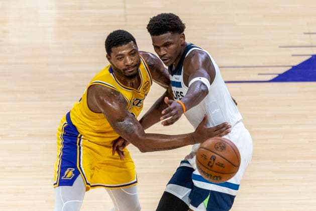 October 24, 2025, Los Angeles, California, USA: Minnesota Timberwolves Anthony Edwards (5) and Los Angeles LakersÃ¢â‚¬â ¢ Marcus Smart (36) vie for the ball during an NBA, Basketball Herren, USA basketball game, in Los Angeles Friday, Oct. 24, 2025. Los Angeles USA - ZUMAc68_ 20251024_zaf_c68_039 Copyright: xRingoxChiux