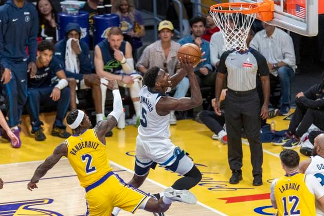 October 24, 2025, Los Angeles, California, USA: Minnesota Timberwolves Anthony Edwards (5) goes past Los Angeles LakersÃ¢â‚¬â ¢ Jarred Vanderbilt (2) to the basket during an NBA, Basketball Herren, USA basketball game, in Los Angeles Friday, Oct. 24, 2025. Los Angeles USA - ZUMAc68_ 20251024_zaf_c68_051 Copyright: xRingoxChiux