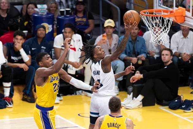 October 24, 2025, Los Angeles, California, USA: Minnesota Timberwolves Bones Hyland (8) goes past Los Angeles LakersÃ¢â‚¬â ¢ Rui Hachimura (28) to the basket during an NBA, Basketball Herren, USA basketball game, in Los Angeles Friday, Oct. 24, 2025. Los Angeles USA - ZUMAc68_ 20251024_zaf_c68_082 Copyright: xRingoxChiux
