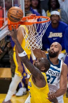 October 24, 2025, Los Angeles, California, USA: Los Angeles LakersÃ¢â‚¬â ¢ Deandre Ayton (5) goes to the basket under pressure from Minnesota Timberwolves Rudy Gobert (27) during an NBA, Basketball Herren, USA basketball game, in Los Angeles Friday, Oct. 24, 2025. Los Angeles USA - ZUMAc68_ 20251024_zaf_c68_094 Copyright: xRingoxChiux
