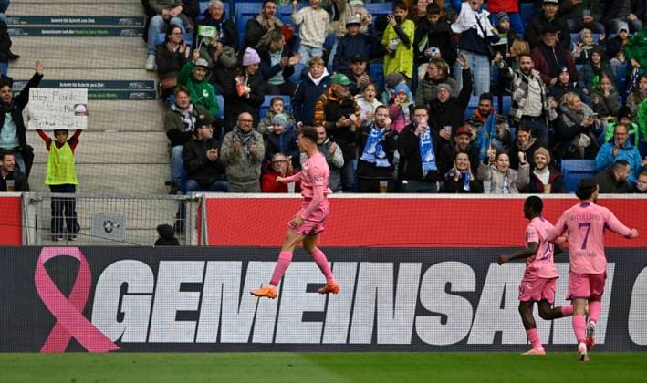 GOAL for 1 0 Fisnik Asllani TSG 1899 Hoffenheim 11 goal celebration Pink violet jersey special jersey campaign TOGETHER AGAINST BREAST CANCER TSG 1899 Hoffenheim in the background perimeter advertising logo Leon Avdullahu TSG 1899 Hoffenheim 07 Bazoumana Toure TSG Hoffenheim TSG 1899 Hoffenheim vs 1 FC Heidenheim 1846 FCH 25 10 2025 DFL REGULATIONS PROHIBIT ANY USE OF PHOTOGRAPHS AS IMAGE SEQUENCES AND OR QUASI VIDEO TSG 1899 Hoffenheim vs 1 FC Heidenheim 1846 FCH