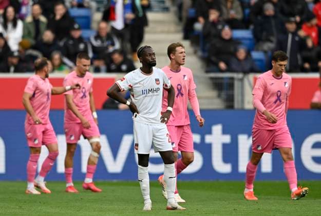 GOAL for 1 0 Fisnik Asllani TSG 1899 Hoffenheim 11 goal celebration Pink violet jersey special jersey campaign TOGETHER AGAINST BREAST CANCER TSG 1899 Hoffenheim in the background perimeter advertising logo front Omar Haktab Traore 1 FC Heidenheim 1846 FCH 23 disappointed TSG 1899 Hoffenheim vs 1 FC Heidenheim 1846 FCH 25 10 2025 DFL REGULATIONS PROHIBIT ANY USE OF PHOTOGRAPHS AS IMAGE SEQUENCES AND OR QUASI VIDEO TSG 1899 Hoffenheim vs 1 FC Heidenheim 1846 FCH