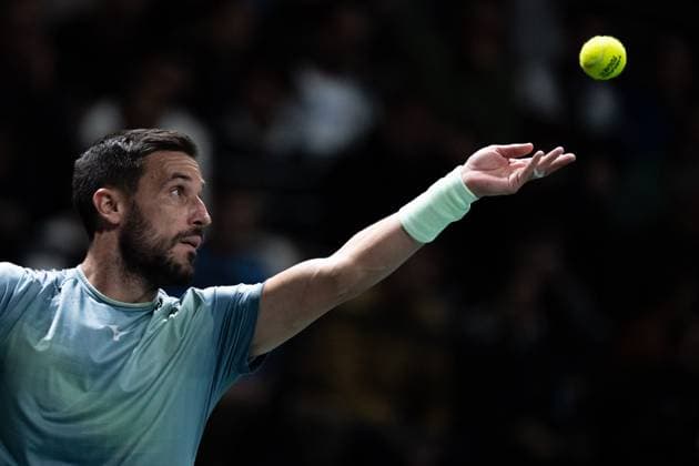 TENNIS : Rolex Paris Masters - Paris - 25 10 2025 Damir Dzumhur ( Bosnia ) serves during the Rolex Paris Masters at Paris La Defense Arena on October 25, 2025 in Nanterre, France. (Photo by Federico Pestellini PSNewz ) ParisFrance  Copyright: xFedericoxPestellinix