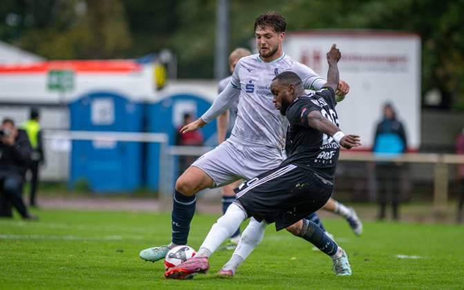 Soccer, Season 2025 2026, Regionalliga West, 25 10 2025, Matchday 13, Men, 1 FC Bocholt black vs VfL Bochum U23 gray v l Daniel Hendrik Huelsenbusch VfL Bochum U23 , Arnold Budimbu 1 FC Bocholt , Bocholt Stadion am Huenting Nordrhein Westfalen Germany 251025_fb_1fc-bocholt_vfl-bochum-u23_45436