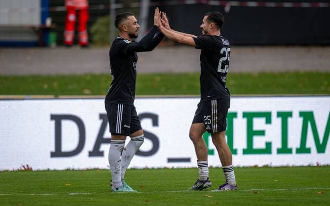 Soccer, Season 2025 2026, Regionalliga West, 25 10 2025, Matchday 13, Men, 1 FC Bocholt black vs VfL Bochum U23 gray v l Stipe Batarilo 1 FC Bocholt , Marvin Lorch 1 FC Bocholt , Bocholt Stadion am Huenting Nordrhein Westfalen Germany 251025_fb_1fc-bocholt_vfl-bochum-u23_45445