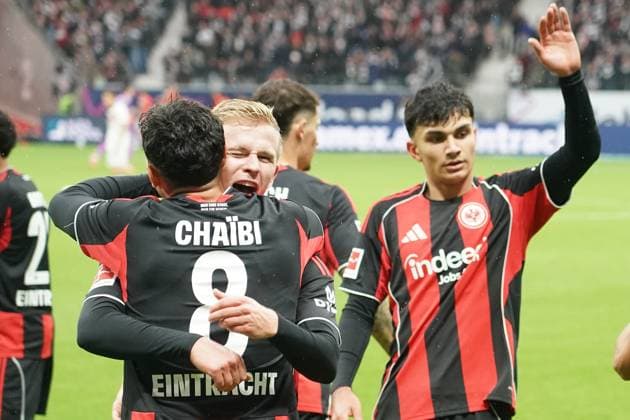 celebrate the goal, goal celebration for 2 0 Jonathan Burkhardt Eintracht Frankfurt, 09 with Fares Chaibi Eintracht Frankfurt, 08 , Can Uzun Eintracht Frankfurt, 42 Frankfurt 25 10 2025 Eintracht Frankfurt vs FC St Pauli, Deutsche Bank Park, 8 Matchday Bundesliga