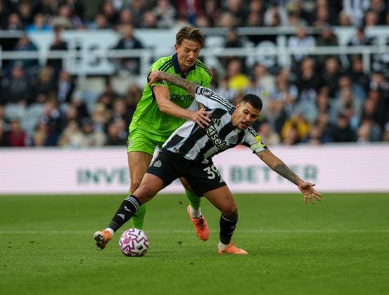 Newcastle Upon Tyne, England, 25th October 2025. Bruno Guimaraes (R) of Newcastle United in action with Sander Berge of Fulham during the Newcastle United vs Fulham Premier League match at St. James Park, Newcastle Upon Tyne. Picture credit should read: Nigel Roddis Sportimage EDITORIAL USE ONLY. No use with unauthorised audio, video, data, fixture lists, club league logos or live services. Online in-match use limited to 120 images, no video emulation. No use in betting, games or single club league player publications. SPI_030_NR_NEWC_FULH SPI-4236-0030
