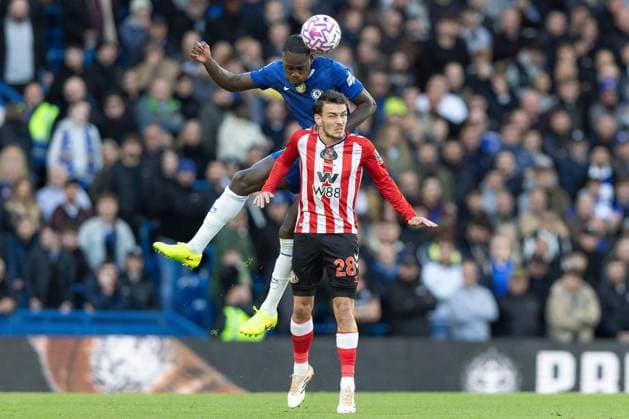 25th October 2025; Stamford Bridge, Chelsea, London, England: Premier League Football, Chelsea versus Sunderland; Trevoh Chalobah of Chelsea wins the ball in the air, beating Arthur Masuaku of Sunderland  IanxStephen