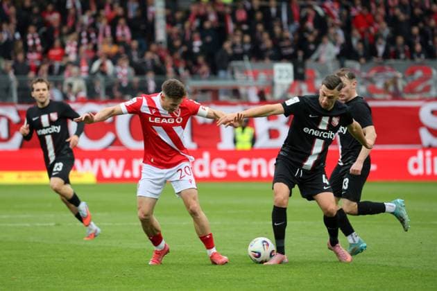 20 Axel Borgmann Energie Cottbus, l in duel with 4 Besfort Kolgeci Havelse Football 3 Liga 2025 2026 FC Energie Cottbus TSV Havelse