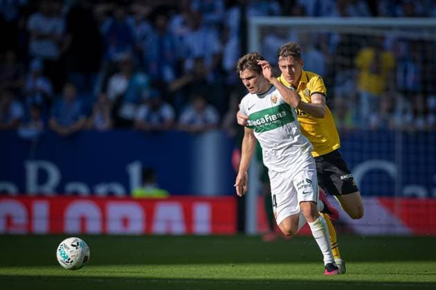 Aleix Febas Elche CF and Ruben Sanchez RCD Espanyol battle for the ball during a La Liga EA Sports match between RCD Espanyol and Elche CF at Stage Front Stadium in Barcelona, , Spain, on October 25 2025 Photo by Felipe Mondino Copyright: x@FELIPExMONDINOx