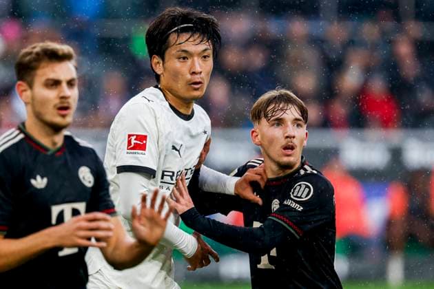Shuto Machino of Borussia Mönchengladbach and Lennart Karl of FC Bayern München looks on Borussia Mönchengladbach v FC Bayern München, Bundesliga, Borussia Mönchengladbach v FC Bayern München, Stadion im Borussia-Park, October 25, 2025, Mönchengladbach, Germany.