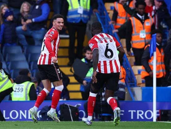 London, England, 25th October 2025. Chemsdine Talbi of Sunderland (l) elebrates scoring their second goal in injury time during the Chelsea vs Sunderland Premier League match at Stamford Bridge, London. Picture credit should read: Paul Terry Sportimage EDITORIAL USE ONLY. No use with unauthorised audio, video, data, fixture lists, club league logos or live services. Online in-match use limited to 120 images, no video emulation. No use in betting, games or single club league player publications. SPI_045_PT_Chelsea_Sunderland SPI-4235-0046