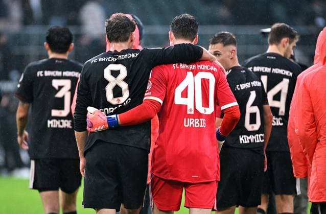 Football, Bundesliga, Germany, Men, Season 2025 2026, Matchday 1, Borussia Park Mönchengladbach, Bor Mönchengladbach FC Bayern Munich 0 3 Leon Goretzka FCB and Jonas Urbig FCB after the end of the match Cheers, joy, action