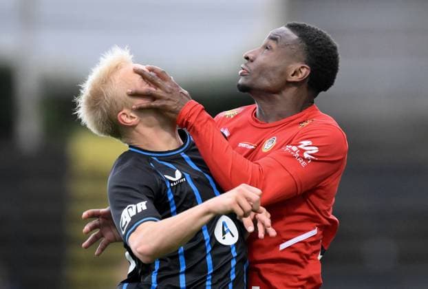 Club s Sacha Marloye and Olympic s Kenny Byissa fight for the ball during a soccer game between Club NXT and Royal Olympic Charleroi, Saturday 25 October 2025 in Roeselare, on day 11 of the 2025-2026 Challenger Pro League 1B second division of the Belgian championship. JOHNxTHYS  x137917329x