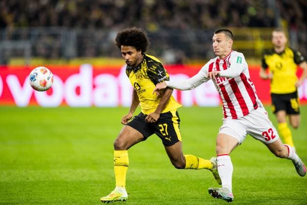 1 Fussball Bundesliga Borussia Dortmund vs 1 FC Koeln, 25 10 2025 DORTMUND, GERMANY OCTOBER 25 Karim Adeyemi Borussia Dortmund, 27 and Kristoffer Lund 1 FC Koeln, 32 fight for the ball during the Bundesliga match between Borussia Dortmund vs 1 FC Koeln at Signal Iduna Park on matchday 8 of the 1 Fussball Bundesliga on October 25, 2025 in Dortmund, Germany Copyright: xBEAUTIFULxSPORTS Wunderlx