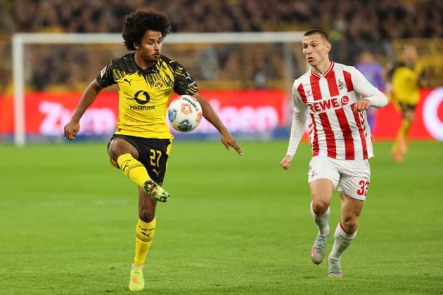 duel between Karim Adeyemi Borussia Dortmund, 27 and Kristoffer Lund 1 FC Koeln, 32 GER, Borussia Dortmund vs 1 FC Koeln, Football, 1 Liga, Matchday 8, Season 2025 2026, 25 10 2025 DFL REGULATIONS PROHIBIT ANY USE OF PHOTOGRAPHS AS IMAGE SEQUENCES AND OR QUASI VIDEO GER, Borussia Dortmund vs 1 FC Koeln, Football, 1 Liga, Matchday 8, Season 2025 2026, 25 10 2025 Dortmund Copyright: xEibner-Pressefoto FrankxZeisingx EP_FZG