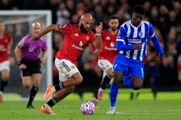 Manchester United, ManU v Brighton and Hove Albion Premier League 25 10 2025. Bryan Mbeumo (19) of Manchester United runs with the ball chased by Carlos Baleba (17) of Brighton & Hove Albion during the Premier League match between Manchester United and Brighton and Hove Albion at Old Trafford, Manchester, England on 25 October 2025. Manchester Old Trafford Greater Manchester England Editorial use only DataCo restrictions apply See www.football-dataco.com , Copyright: xConorxMolloyx PSI-23095-0058