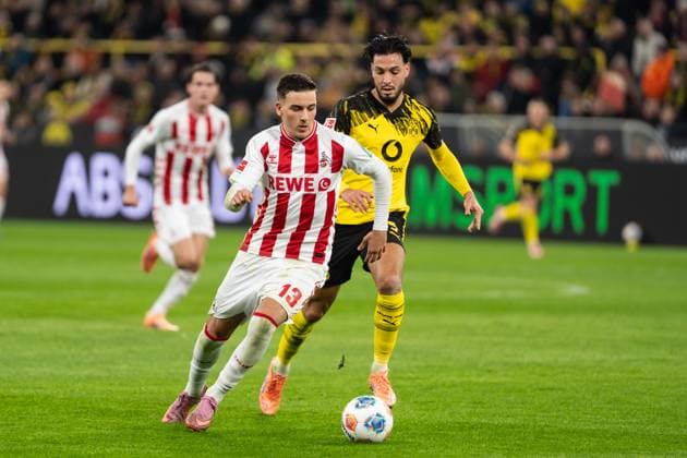 GER, 1 FBL, Borussia Dortmund vs 1 FC Köln 25 10 2025, Signal Iduna Park, Dortmund, GER, 1 FBL, Borussia Dortmund vs 1 FC Köln in picture duel between Said El Mala 1 FC Köln Koeln, 13 and Ramy Bensebaini Borussia Dortmund, 5 nordphotoxGmbHxx xChristianxSchulze nph000300