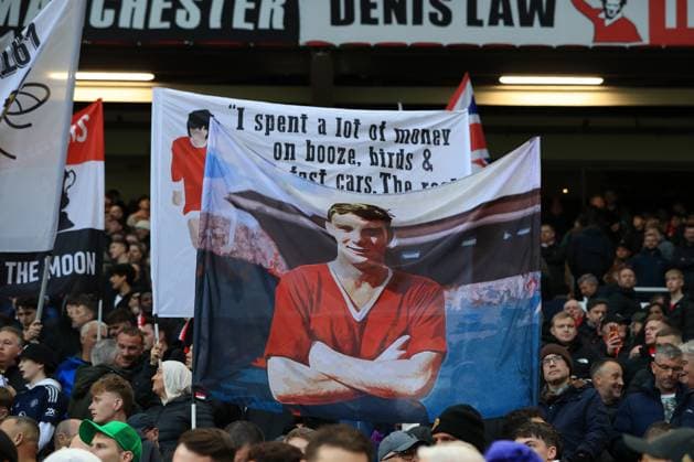 25th October 2025; Old Trafford, Manchester, England; Premier League Football, Manchester United, ManU versus Brighton and Hove Albion; Manchester United supporters in the Stratford End display banners  DavidxBlunsden