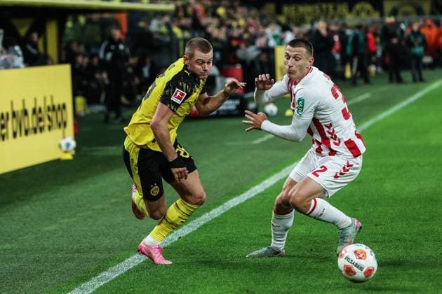 Sport, Football, Bundesliga Season 2025 2026 8 Matchday Borussia Dortmund 1 FC Köln 25 10 2025, SIGNAL IDUNA PARK Julian Ryerson Borussia Dortmund, 26 Kristoffer Lund 1 FC Köln, 32 Dortmund SIGNAL IDUNA PARK North Rhine-Westphalia Germany