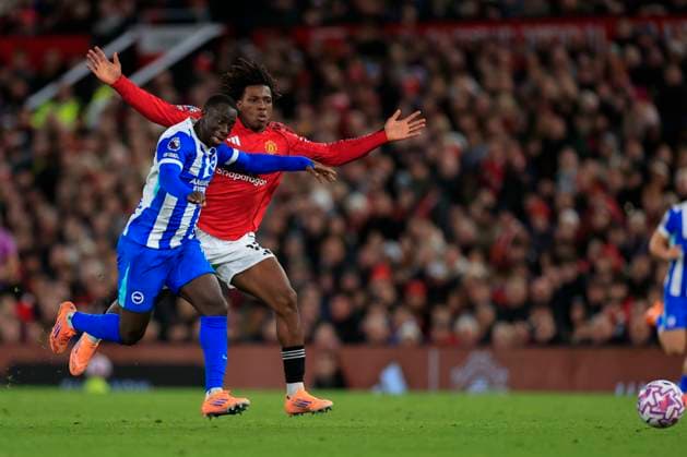 Manchester United, ManU v Brighton and Hove Albion Premier League 25 10 2025. Yankuba Minteh (11) of Brighton & Hove Albion is fouled by Patrick Dorgu (13) of Manchester United during the Premier League match between Manchester United and Brighton and Hove Albion at Old Trafford, Manchester, England on 25 October 2025. Manchester Old Trafford Greater Manchester England Editorial use only DataCo restrictions apply See www.football-dataco.com , Copyright: xConorxMolloyx PSI-23095-0069