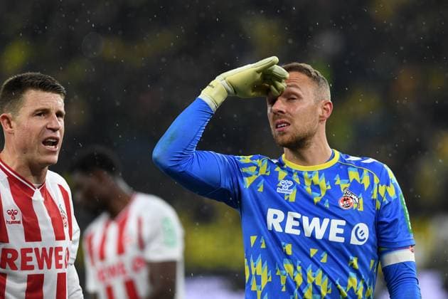 Dominique Heintz (1. FC Koeln) und Torwart Marvin Schwaebe (1. FC Koeln) gestikuliert, gestik waehrend des Spiels der Bundesliga zwischen Borussia Dortmund und 1. FC Köln, Signal Iduna Park am 25. October 2025 in Dortmund, Deutschland. (Foto von Ralf Treese DeFodi Images) +++ Dominique Heintz (1. FC Koeln) und Torwart Marvin Schwaebe (1. FC Koeln) gestures during the Bundesliga match between Borussia Dortmund and 1. FC Köln at Signal Iduna Park on October 25, 2025 in Dortmund, Germany. (Photo by Ralf Treese DeFodi Images) DFL regulations prohibit any use of photographs as image sequences and or quasi-video. (Photo by Ralf Treese DeFodi Images) Dominique Heintz 1 FC Koeln and goalkeeper Marvin Schwaebe 1 FC Koeln gestures, gestures during the Bundesliga match between Borussia Dortmund and 1 FC Köln, Signal Iduna Park on October 25, 2025 in Dortmund, Germany Photo by Ralf Treese DeFodi Images Dominique Heintz 1 FC Koeln and goalkeeper Marvin Schwaebe 1 FC Koeln gestures during the Bundesliga match between Borussia Dortmund and 1 FC Köln at Signal Iduna Park on October 25, 2025 in Dortmund, Germany Photo by Ralf Treese DeFodi Images DFL regulations prohibit any use of photographs as image sequences and or quasi video Photo by Ralf Treese DeFodi Images