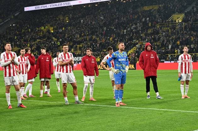 Dominique Heintz (1. FC Koeln), Tom Krauss (1. FC Koeln), Denis Huseinbasic (1. FC Koeln), Joel Schmied (1. FC Koeln), Alessio Castro-Montes (1. FC Koeln), Eric Martel (1. FC Koeln), Torwart Marvin Schwaebe (1. FC Koeln) enttaeuscht nach Spielende waehrend des Spiels der Bundesliga zwischen Borussia Dortmund und 1. FC Köln, Signal Iduna Park am 25. October 2025 in Dortmund, Deutschland. (Foto von Ralf Treese DeFodi Images) +++ Dominique Heintz (1. FC Koeln), Tom Krauss (1. FC Koeln), Denis Huseinbasic (1. FC Koeln), Joel Schmied (1. FC Koeln), Alessio Castro-Montes (1. FC Koeln), Eric Martel (1. FC Koeln), Torwart Marvin Schwaebe (1. FC Koeln) look dejected during the Bundesliga match between Borussia Dortmund and 1. FC Köln at Signal Iduna Park on October 25, 2025 in Dortmund, Germany. (Photo by Ralf Treese DeFodi Images) DFL regulations prohibit any use of photographs as image sequences and or quasi-video. (Photo by Ralf Treese DeFodi Images) Dominique Heintz 1 FC Koeln , Tom Krauss 1 FC Koeln , Denis Huseinbasic 1 FC Koeln , Joel Schmied 1 FC Koeln , Alessio Castro Montes 1 FC Koeln , Eric Martel 1 FC Koeln , Goalkeeper Marvin Schwaebe 1 FC Koeln disappointed after the end of the match during the Bundesliga match between Borussia Dortmund and 1 FC Köln, Signal Iduna Park on October 25, 2025 in Dortmund, Germany Photo by Ralf Treese DeFodi Images Dominique Heintz 1 FC Koeln , Tom Krauss 1 FC Koeln , Denis Huseinbasic 1 FC Koeln , Joel Schmied 1 FC Koeln , Alessio Castro Montes 1 FC Koeln , Eric Martel 1 FC Koeln , Goalkeeper Marvin Schwaebe 1 FC Koeln look dejected during the Bundesliga match between Borussia Dortmund and 1 FC Köln at Signal Iduna Park on October 25, 2025 in Dortmund, Germany Photo by Ralf Treese DeFodi Images DFL regulations prohibit any use of photographs as image sequences and or quasi video Photo by Ralf Treese DeFodi Images