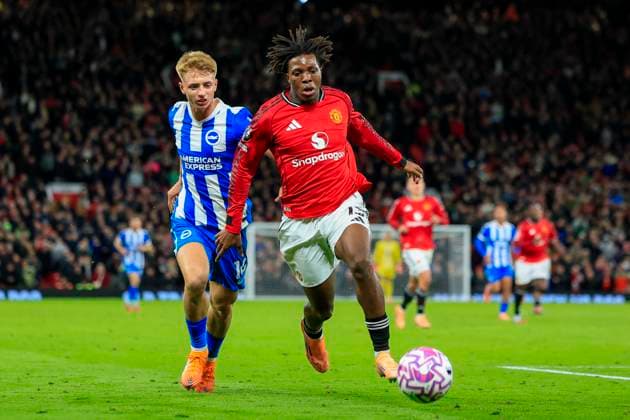 Manchester United, ManU v Brighton and Hove Albion Premier League 25 10 2025. Patrick Dorgu (13) of Manchester United and Tom Watson (14) of Brighton & Hove Albion challenge for the ball during the Premier League match between Manchester United and Brighton and Hove Albion at Old Trafford, Manchester, England on 25 October 2025. Manchester Old Trafford Greater Manchester England Editorial use only DataCo restrictions apply See www.football-dataco.com , Copyright: xConorxMolloyx PSI-23095-0090