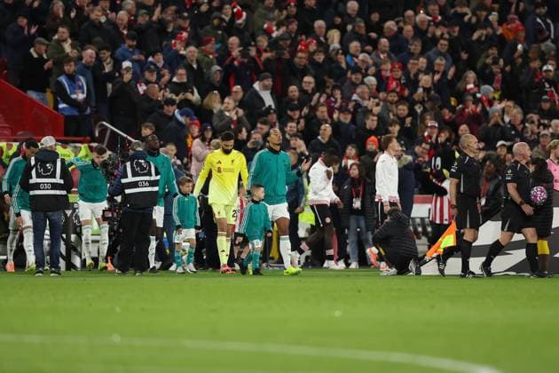 25th October 2025; Gtech Community Stadium, Brentford, London, England; Premier League Football, Brentford versus Liverpool; Liverpool captain Virgil van Dijk leads his team out for the match  KatiexChan