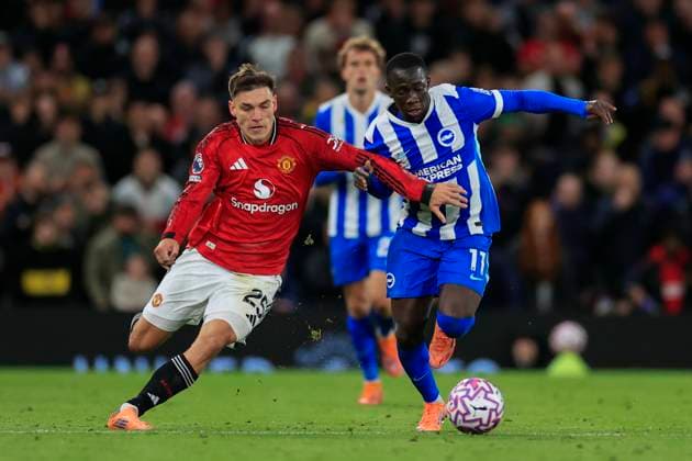 Manchester United, ManU v Brighton and Hove Albion Premier League 25 10 2025. Yankuba Minteh (11) of Brighton & Hove Albion is challenged by Manuel Ugarte (25) of Manchester United during the Premier League match between Manchester United and Brighton and Hove Albion at Old Trafford, Manchester, England on 25 October 2025. Manchester Old Trafford Greater Manchester England Editorial use only DataCo restrictions apply See www.football-dataco.com , Copyright: xConorxMolloyx PSI-23095-0092