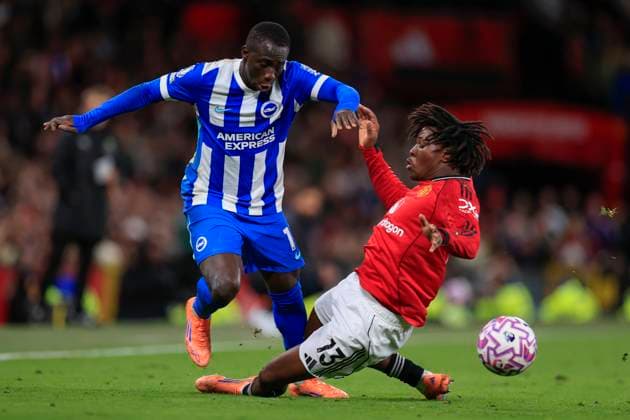 Manchester United, ManU v Brighton and Hove Albion Premier League 25 10 2025. Yankuba Minteh (11) of Brighton & Hove Albion runs past Patrick Dorgu (13) of Manchester United during the Premier League match between Manchester United and Brighton and Hove Albion at Old Trafford, Manchester, England on 25 October 2025. Manchester Old Trafford Greater Manchester England Editorial use only DataCo restrictions apply See www.football-dataco.com , Copyright: xConorxMolloyx PSI-23095-0096