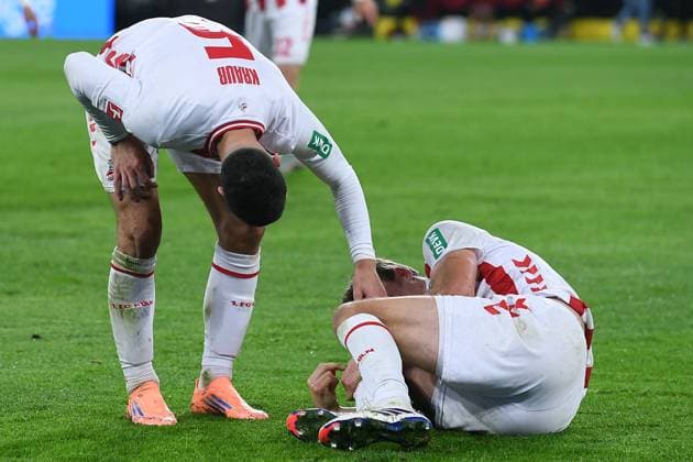 Soccer 1 Bundesliga 8 Matchday Borussia Dortmund 1 FC Köln on 25 10 2025 at Signal Iduna Park in Dortmund Timo Hübers Köln injured on the ground DFL regulations prohibit any use of photographs as image sequences and or quasi video xRx