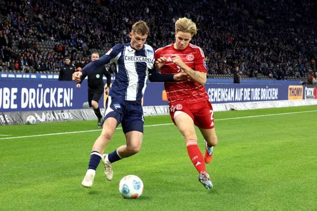 DEU, DFL, 2 FBL, Hertha BSC vs Forrtuna Duesseldorf, 25 10 2025, Berliner Olympiastadion, Berlin, DEU, DFL, 2 FBL, Hertha BSC vs Forrtuna Duesseldorf, im Bild Michael Cuisance Hertha BSC Berlin 10 , JESPER DALAND Fortuna Duesseldorf 2 DFL regulations prohibit any use of Photographs as image sequences and or quasi video nordphotoxGmbHx xEngler nph00076