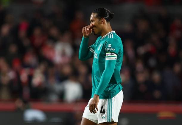 London, England, 25th October 2025. Virgil van Dijk of Liverpool looks dejected after Kevin Schade (not pictured) of Brentford scores to make it 2-0 during the Brentford vs Liverpool Premier League match at Gtech Community Stadium, London. Picture credit should read: Paul Terry Sportimage EDITORIAL USE ONLY. No use with unauthorised audio, video, data, fixture lists, club league logos or live services. Online in-match use limited to 120 images, no video emulation. No use in betting, games or single club league player publications. SPI_014_PT_Brentford_Liverrpool SPI-4238-0014