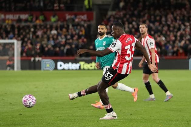25th October 2025; Gtech Community Stadium, Brentford, London, England; Premier League Football, Brentford versus Liverpool; Michael Kayode of Brentford crosses into the Liverpool box  KatiexChan
