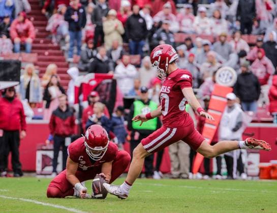 October 25, 2025, Fayetteville, Arkansas, USA: Arkansas Razorbacks kicker SCOTT STARZYK (80) kicks a extra point during Auburn s win over Arkansas at Donald W. Reynolds Razorback Stadium. Fayetteville USA - ZUMAs199 20251025_znp_s199_024 Copyright: xBrentxSoulex