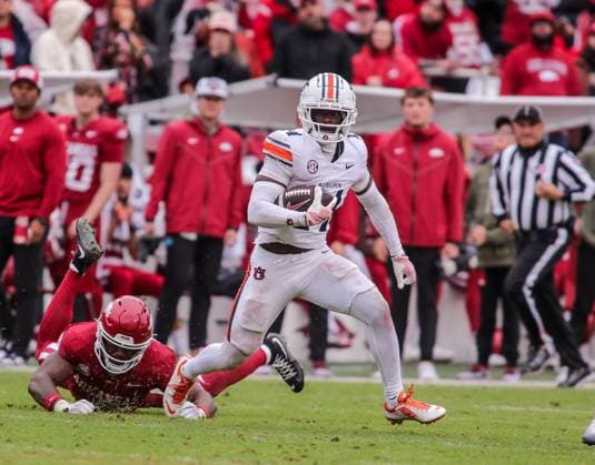 October 25, 2025, Fayetteville, Arkansas, USA: Auburn Tiger corner back RAYSHAWN PLEASANT (14) returns an interception during Auburn s win over Arkansas at Donald W. Reynolds Razorback Stadium. Fayetteville USA - ZUMAs199 20251025_znp_s199_056 Copyright: xBrentxSoulex