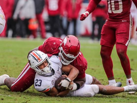 October 25, 2025, Fayetteville, Arkansas, USA: Auburn Tiger running back JEREMIAH COBB (23) is brought down short of the goalline during Auburn s win over Arkansas at Donald W. Reynolds Razorback Stadium. Fayetteville USA - ZUMAs199 20251025_znp_s199_057 Copyright: xBrentxSoulex