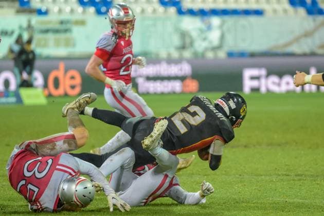 Kai Michael Hunter (Team Germany, 02) runs with the ball and got tackled, Team Austria vs Team Germany, American Football, European Championship, EM, Europameisterschaft Semifinal, Season 2025, 25.10.2025, Krefeld Grotenburg Stadion Germany Copyright: xFootxBowl JUSTxSHOTSx