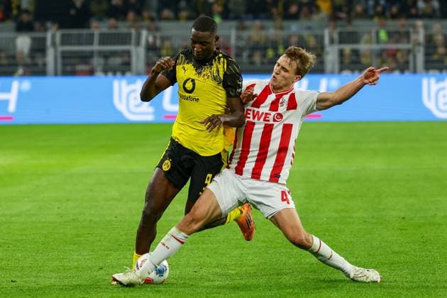 Dortmund, Signal Iduna Park, 25 10 25, GER, Men, 1 Bundesliga, Season 2025 2026, Borussia Dortmund 1 FC Koeln, Serhou Guirassy Borussia Dortmund and Timo Huebers 1 FC Koeln in a duel, DFB DFL REGULATIONS PROHIBIT ANY USE OF PHOTOGRAPHS AS IMAGE SEQUENCES AND OR QUASI VIDEO Copyright: JoachimxBywaletz xJB-Sportfoto