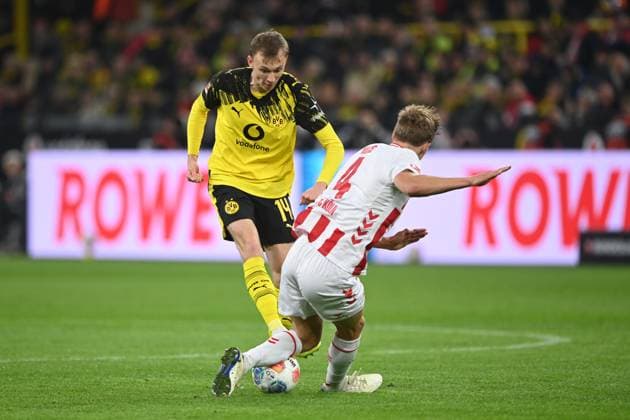 Maximilian BEIER DO vs Timo HUEBERS Hübers, K action, duel, Football 1 Bundesliga, 8 Matchday, matchday8, Borussia Dortmund DO 1 FC Koeln K 1 0 on 25 10 2025 in Dortmund Germany UEFA regulations prohibit any use of photographs as image sequences and or quasi video Â