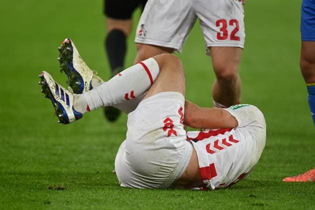 Timo HUEBERS Hübers, K lies injured on the grass, injured, injury, Football 1 Bundesliga, 8 Matchday, matchday8, Borussia Dortmund DO 1 FC Koeln K 1 0 on 25 10 2025 in Dortmund Germany UEFA regulations prohibit any use of photographs as image sequences and or quasi video Â